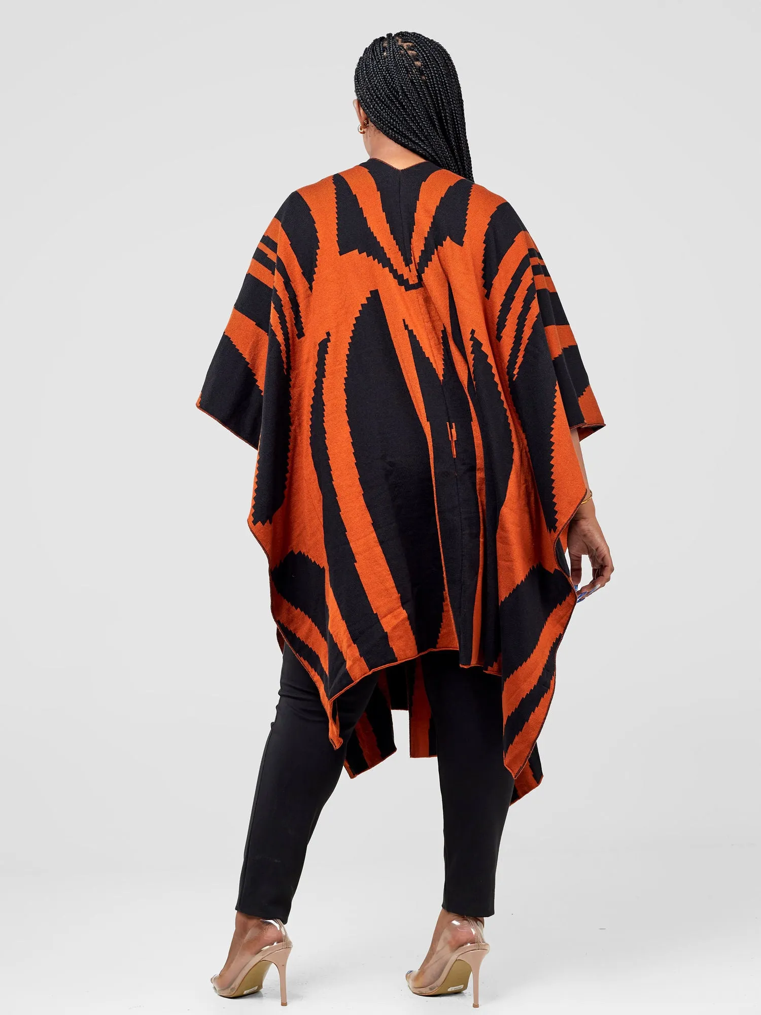 Vivo Reversible Printed Poncho - Black / Rust Jito Print