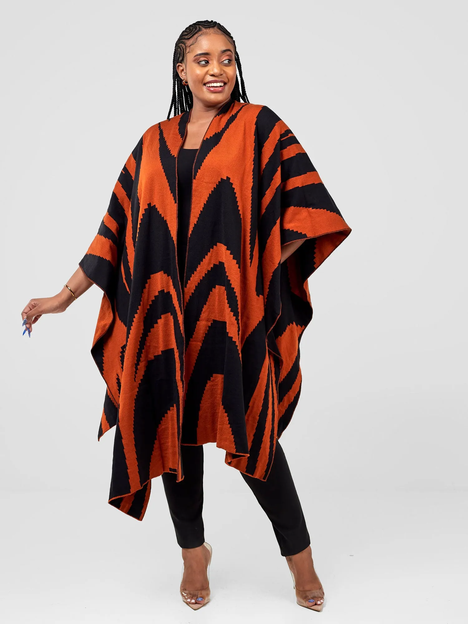 Vivo Reversible Printed Poncho - Black / Rust Jito Print