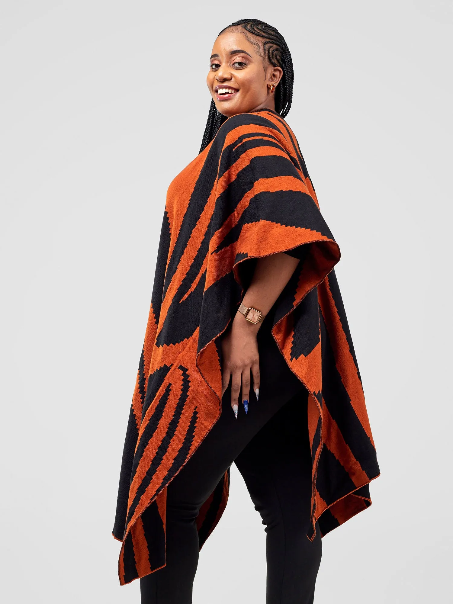 Vivo Reversible Printed Poncho - Black / Rust Jito Print